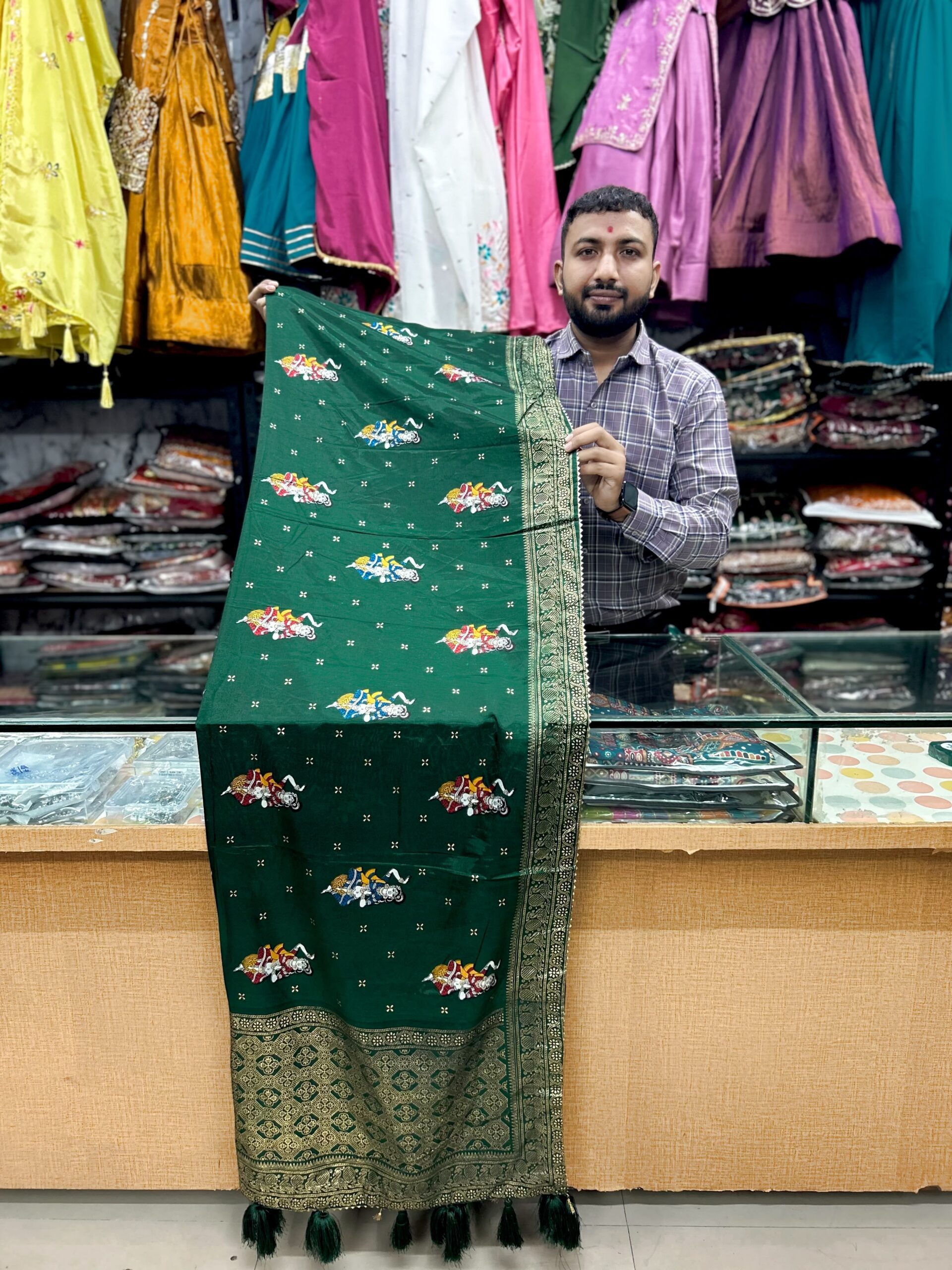 Dark Green Kalamkari Style Silk Printed Dupatta with Traditional Border and Tassels by KGM Brand Dark Green Kalamkari Style Silk Printed Dupatta with Traditional Border and Tassels by KGM Brand